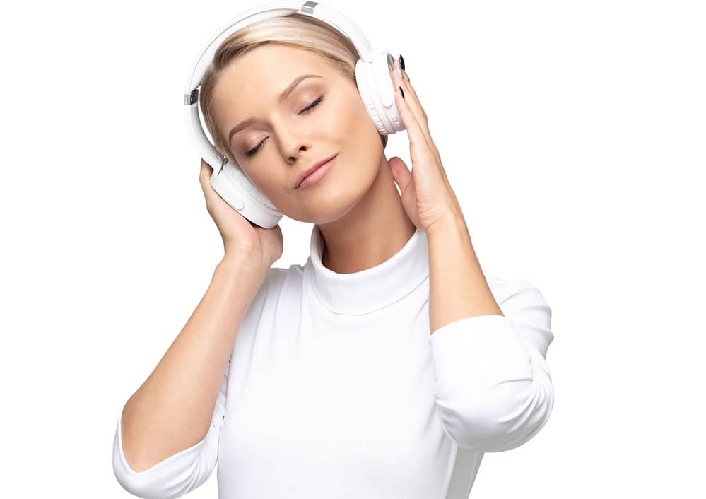 woman listening to music looking at peace